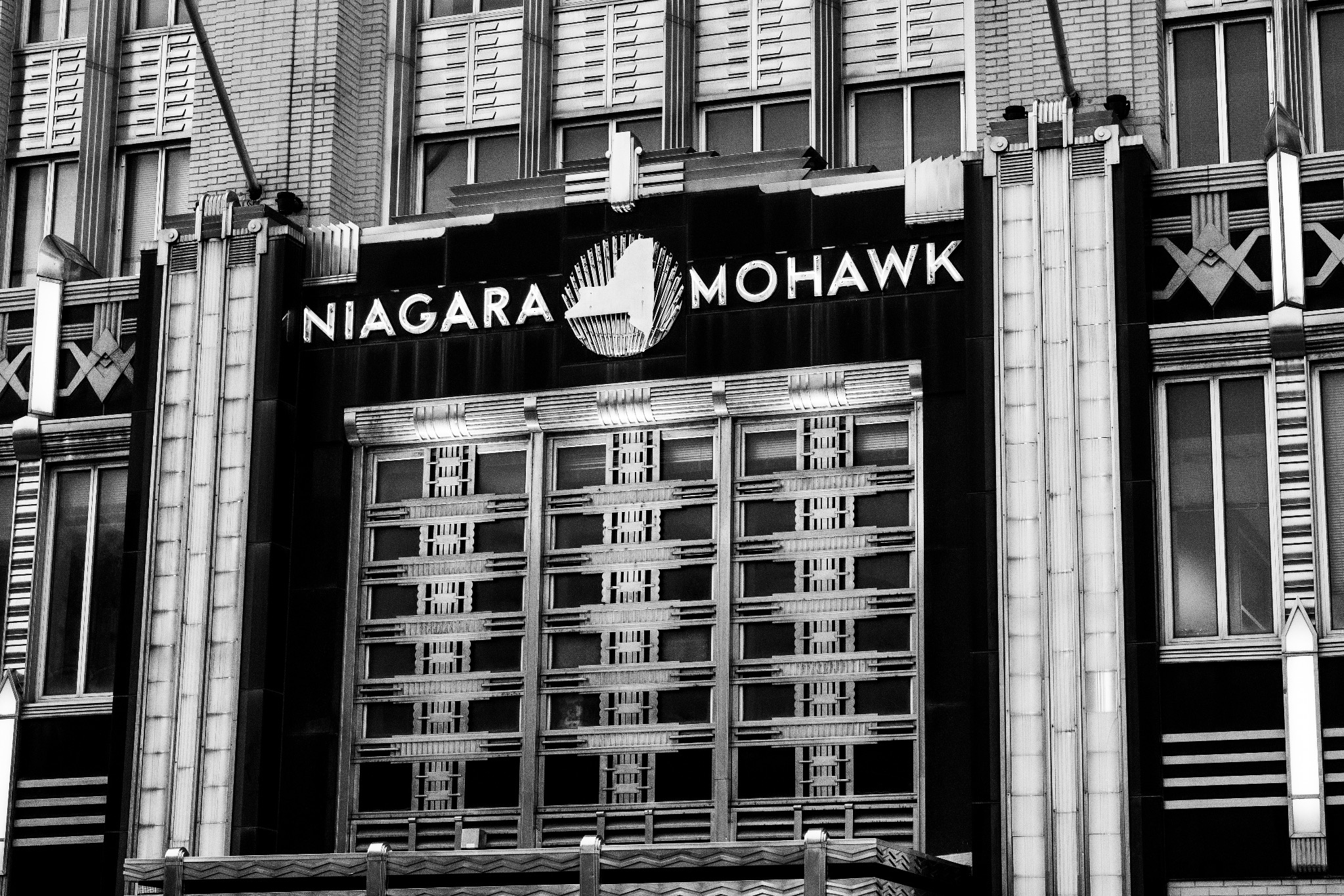 Black-and-white Niagara Mohawk lettering and geometric facade ornament