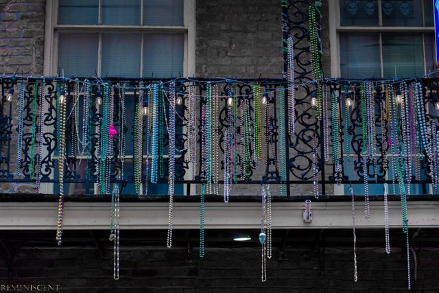 Mardi Gras beads balcony