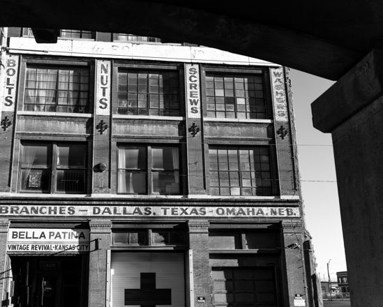 Warehouse lettering through beams — alternate view 2