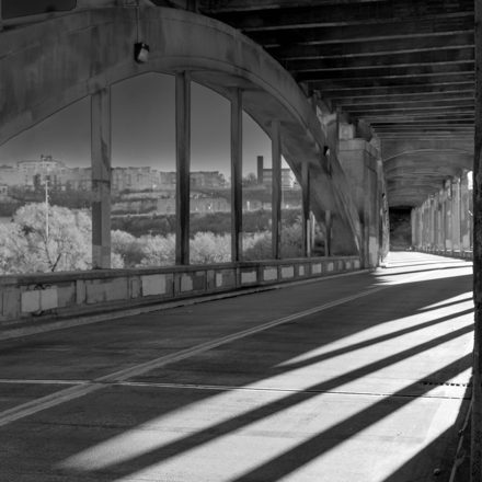 Diagonal light through the arcade — alternate view 2