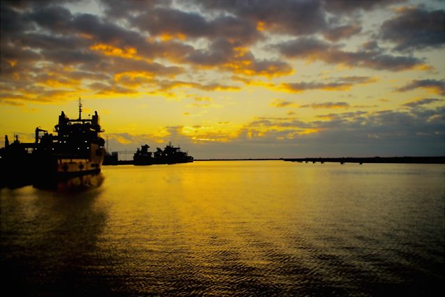Workboat in warm sunrise